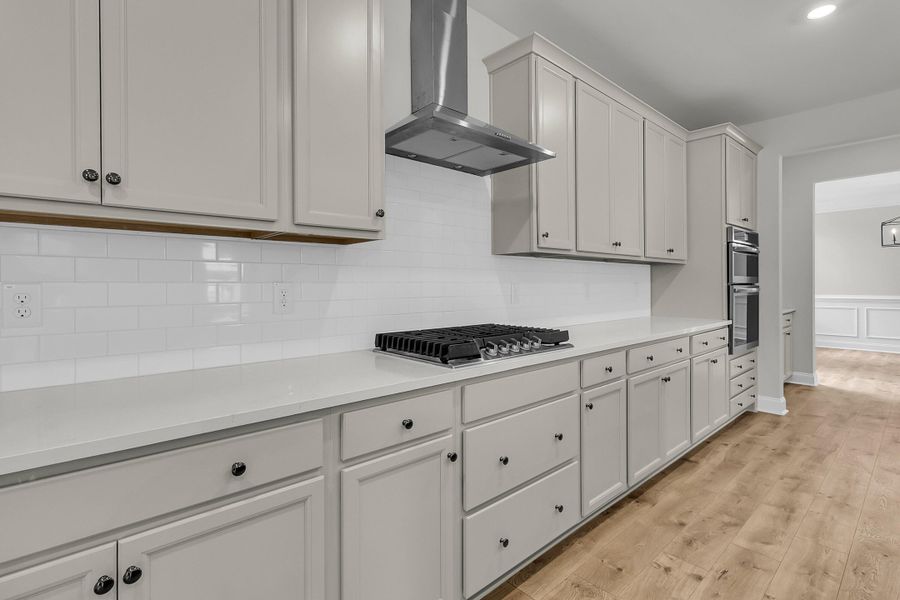 Furnished interior view inside a new home in Tidewater at Lakes of Cane Bay, Summerville (Image 12).