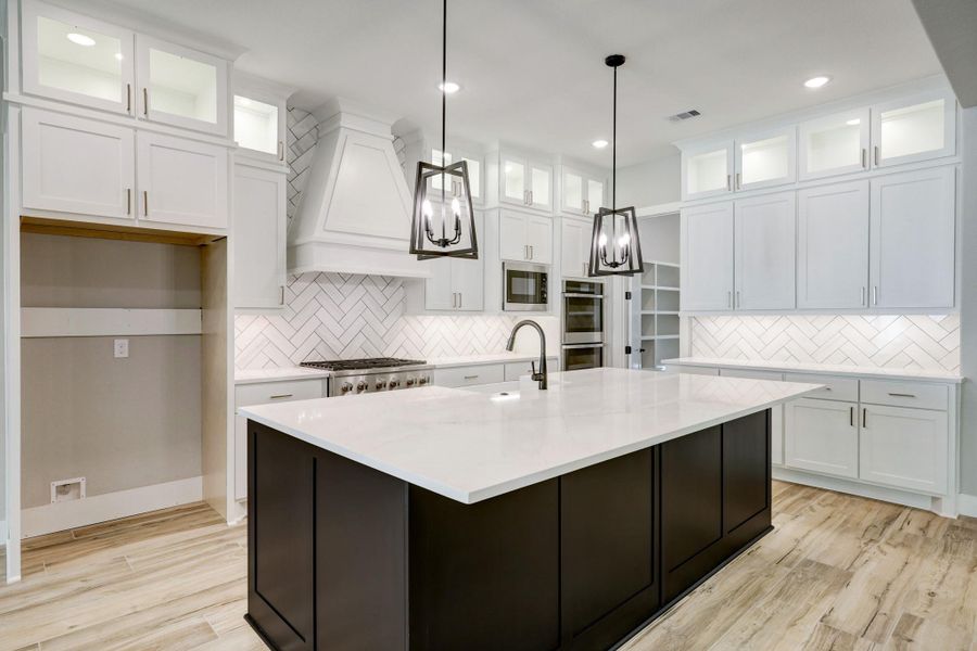 THE PICTURE SHOWN IS NOT THE ACTUAL HOME. TRINITY SIGNATUE HOMES IS BUILDING A SIMILAR FLOOR PLAN. THE PICTURE SHOWN IS NOT THE ACTUAL HOME. TRINITY SIGNATUE HOMES IS BUILDING A SIMILAR FLOOR PLAN.