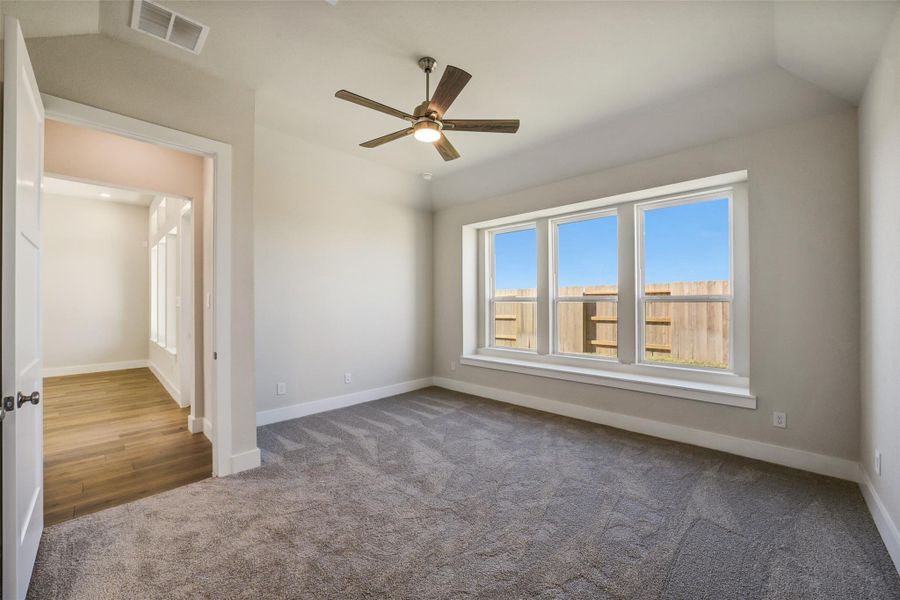 Spacious, unfurnished interior of a new home in Sunterra, Katy (Image 31).