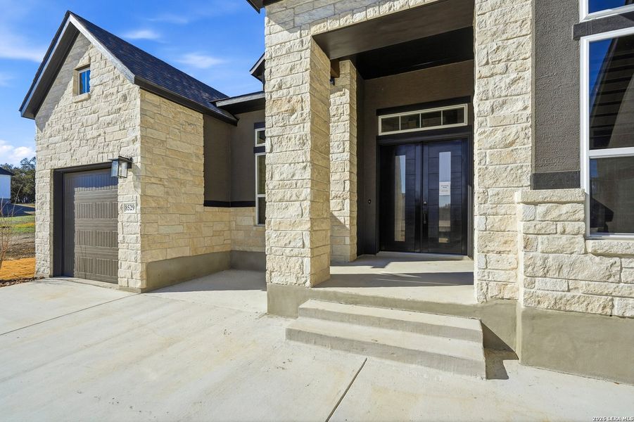 Exterior details and patio area of a home in Heimer Estates at Garden Ridge, San Antonio (Image 30).