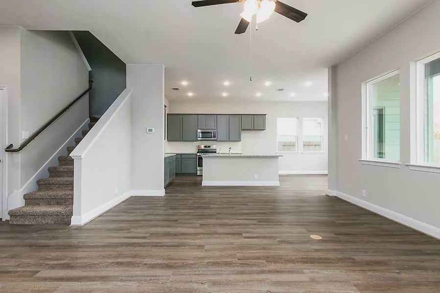 Representative unfurnished interior of a home built from the Finnigan by Chesmar Homes in Buffalo Crossing, Cibolo (Image 9).