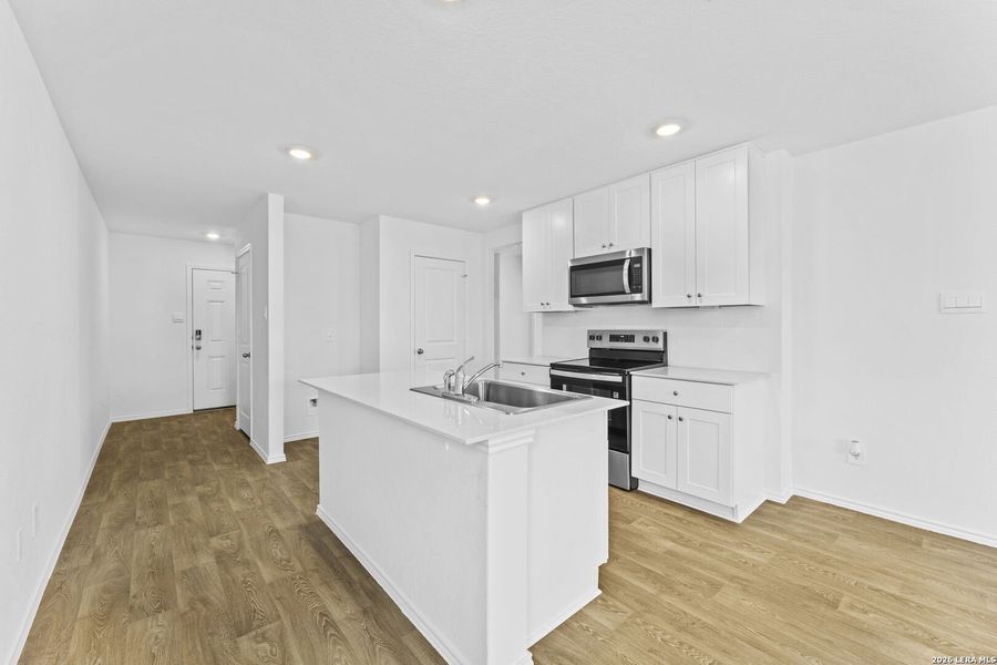 Furnished interior view inside a new home in Arroyo Ranch, Seguin (Image 6).