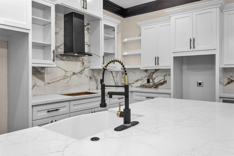 Look at these granite counters and easy to maintain marble style backsplash. And let's not miss the handle pulls and faucet. Look at these granite counters and easy to maintain marble style backsplash. And let's not miss the handle pulls and faucet.