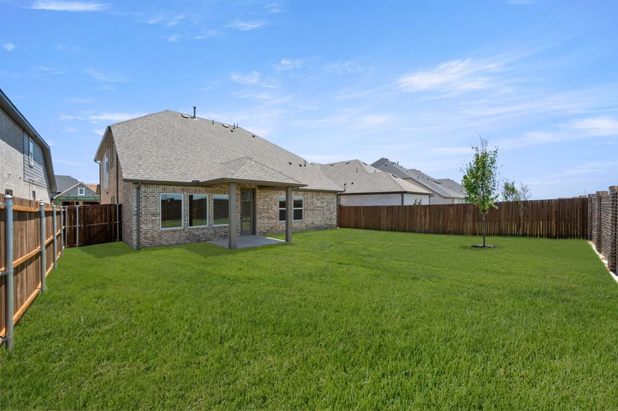 Exterior details and patio area of a home in Wildflower Ranch, Fort Worth (Image 22).