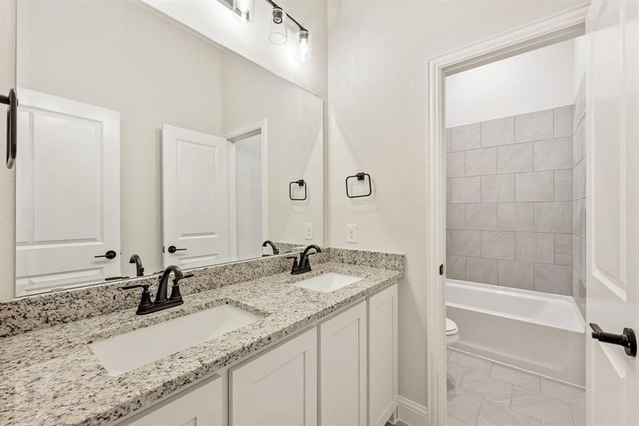 Furnished interior view inside a new home in Homestead at Daniel Farms, DeSoto (Image 10).