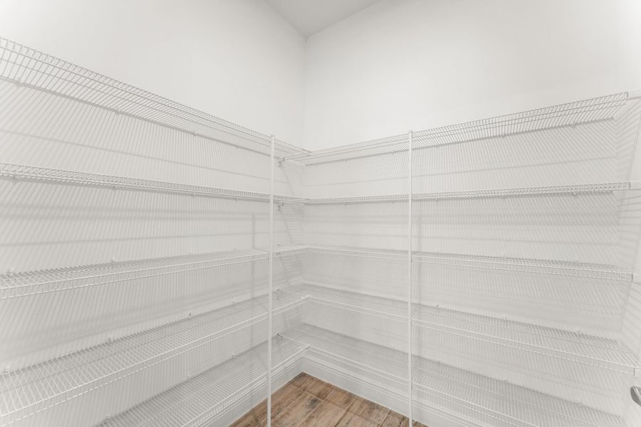 Front exterior of a new home in Newfield - Rosette Park, Palm City, FL, highlighting curb appeal (Image 15).