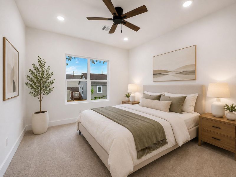 Bedroom 2 offers a bright, comfortable retreat with generous space, natural light, and high ceilings.