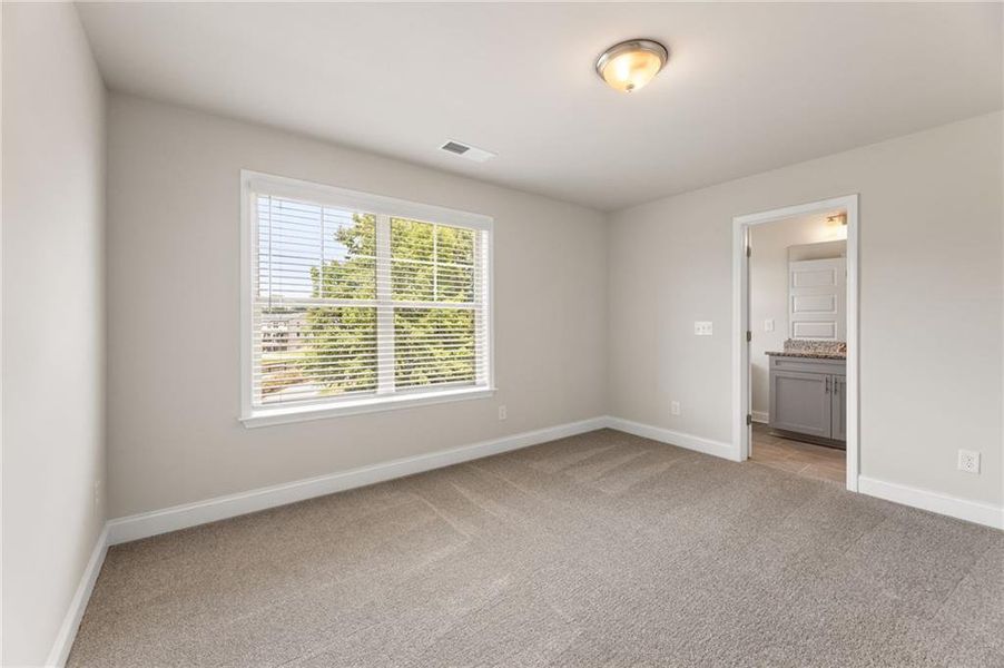 Spacious, unfurnished interior of a new home in Towns at Enclave, Lawrenceville (Image 25).