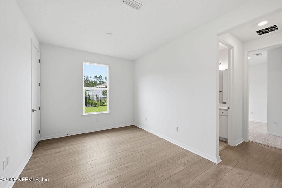 Spacious, unfurnished interior of a new home in Del Webb Wildlight, Yulee (Image 14).