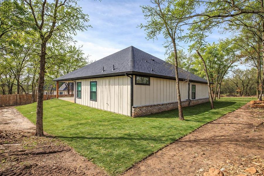 Exterior details and patio area of a home in , Runaway Bay (Image 32). Exterior details and patio area of a home in , Runaway Bay (Image 32).