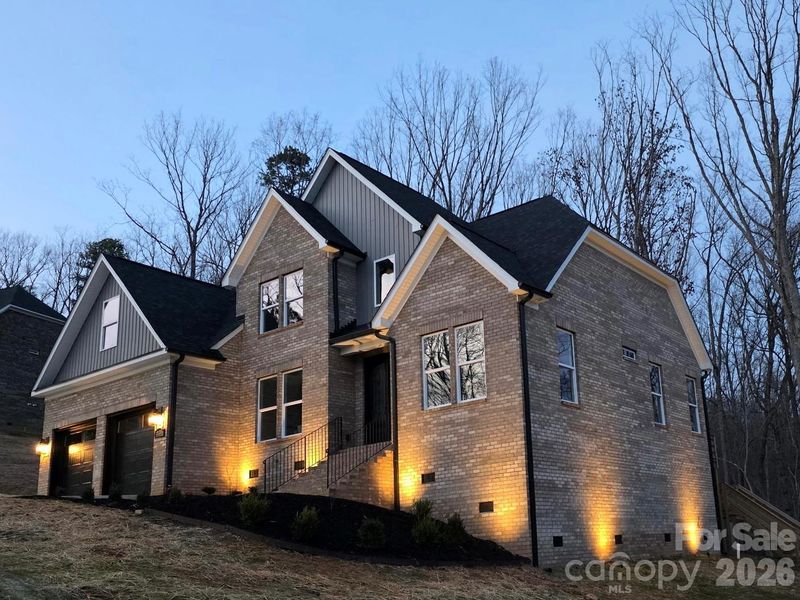Front exterior of a new home in , Dallas, NC, highlighting curb appeal (Image 23).