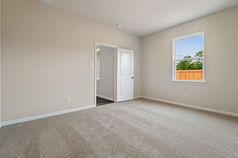 Spacious, unfurnished interior of a new home in Trails at Cochran Ranch, Waller (Image 15).