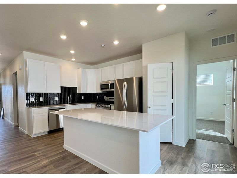 Furnished interior view inside a new home in Union Colony West, Greeley (Image 11).