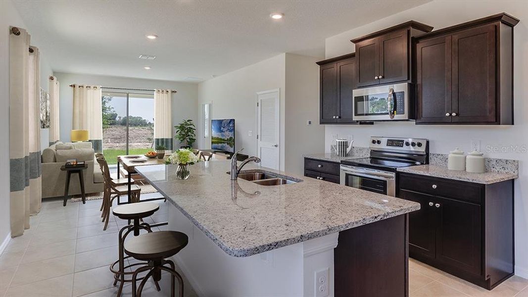 Furnished interior view inside a new home in Twisted Oaks, Wildwood (Image 3).