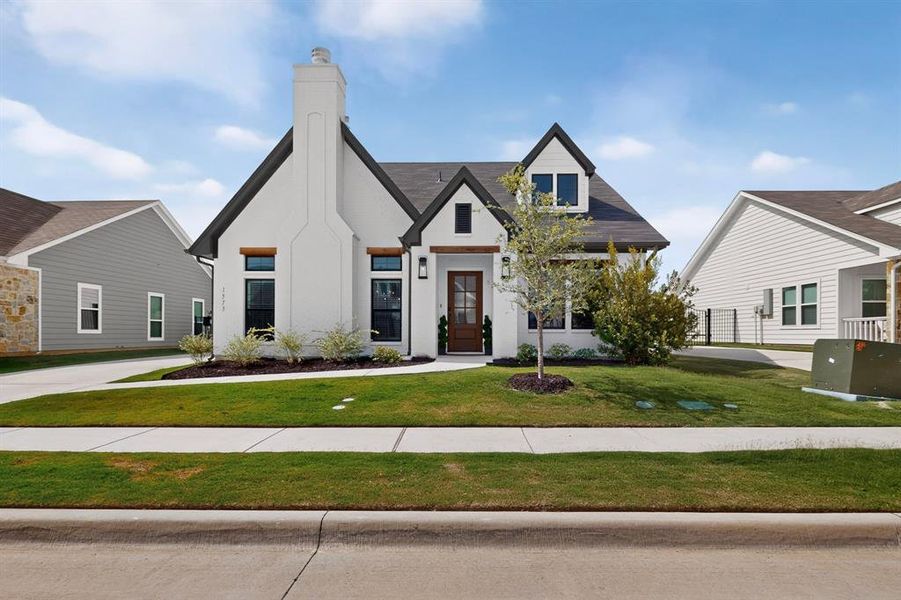 Front exterior of a new home in , Burleson, TX, highlighting curb appeal (Image 21).