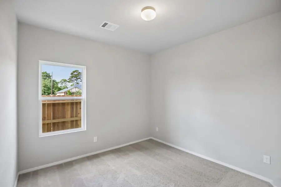 Spacious, unfurnished interior of a new home in Sorella, Tomball (Image 18).