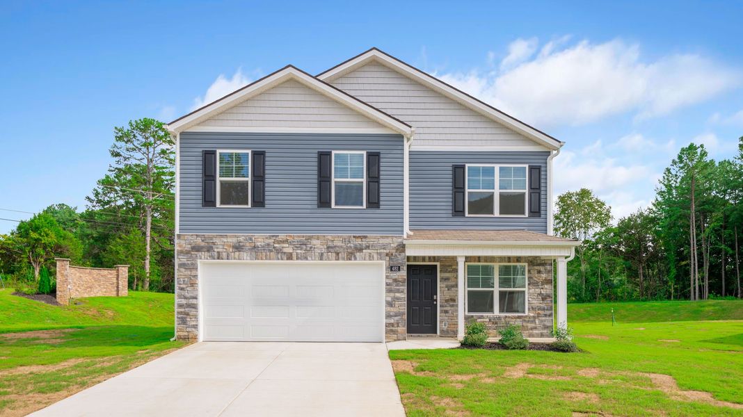 Front exterior of a new home in Byrd Farms, Dayton, TN, highlighting curb appeal (Image 2). Front exterior of a new home in Byrd Farms, Dayton, TN, highlighting curb appeal (Image 2).