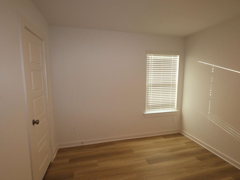 Spacious, unfurnished interior of a new home in Pinewood at Grand Texas, New Caney (Image 19).