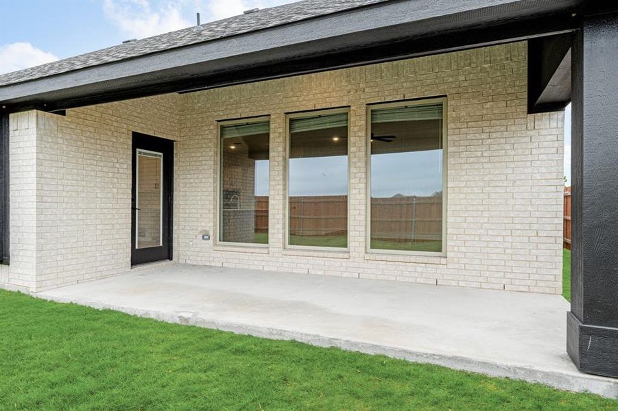 Front exterior of a new home in The Retreat at North Grove 60, Waxahachie, TX, highlighting curb appeal (Image 27). Front exterior of a new home in The Retreat at North Grove 60, Waxahachie, TX, highlighting curb appeal (Image 27).