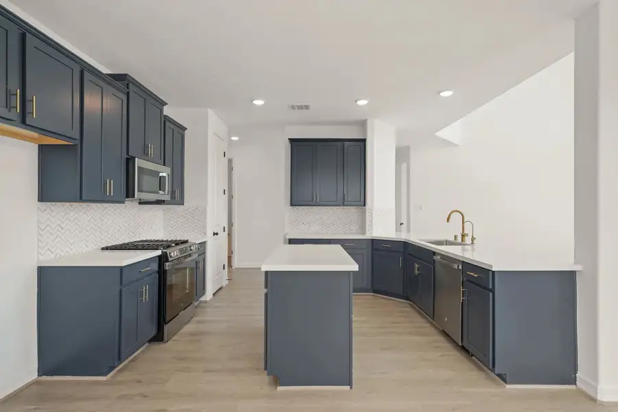 Kitchen. Sample product photo. Actual exterior and interior selections may vary by homesite. Photo may be virtually staged. Kitchen. Sample product photo. Actual exterior and interior selections may vary by homesite. Photo may be virtually staged.