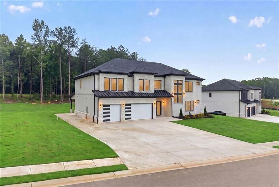 Front exterior of a new home in , Auburn, GA, highlighting curb appeal (Image 2). Front exterior of a new home in , Auburn, GA, highlighting curb appeal (Image 2).