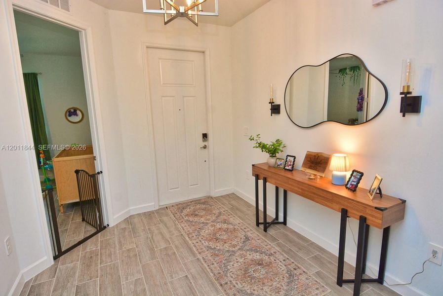 Furnished interior view inside a new home in Central Park, Port St. Lucie (Image 10).
