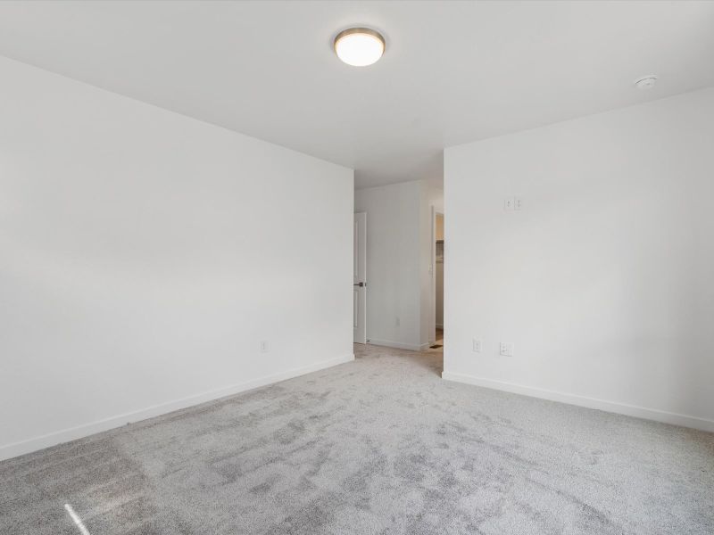 Spacious, unfurnished interior of a new home in The Commons at Victory Ridge, Colorado Springs (Image 7).