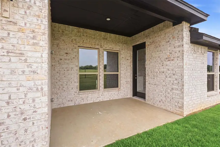 Exterior details and patio area of a home in , Tolar (Image 20).