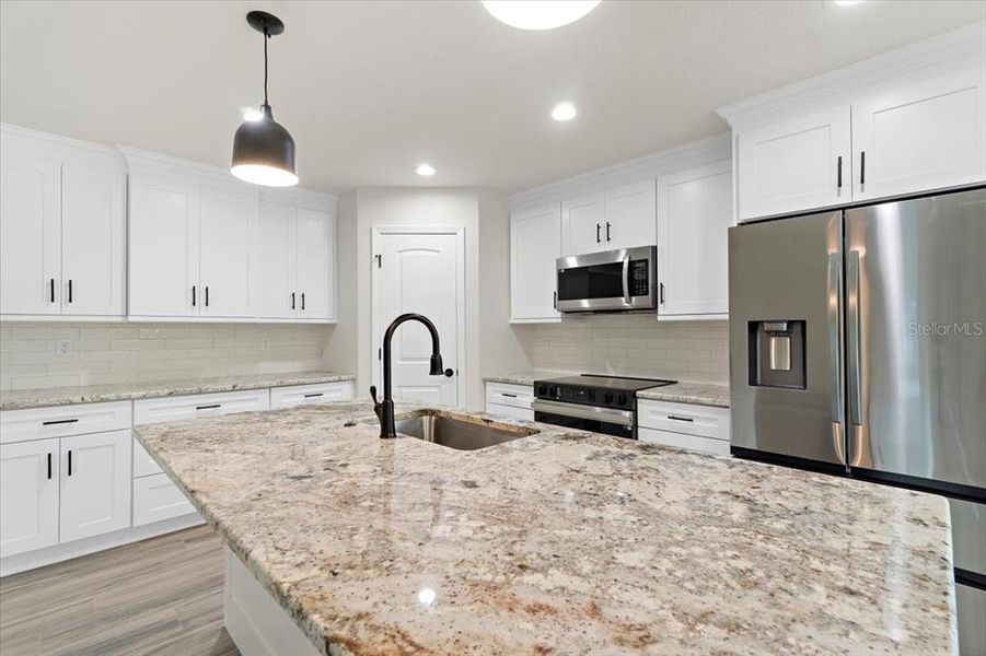 Furnished interior view inside a new home in , Englewood (Image 2). Furnished interior view inside a new home in , Englewood (Image 2).