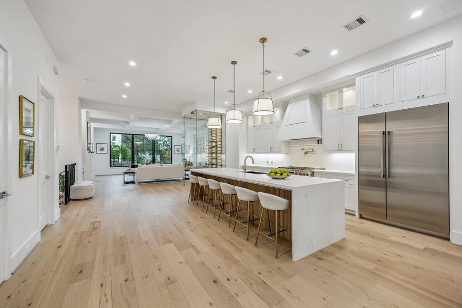 Great, open expansive space. Large Island with Breakfast Bar Seating for Six and Acoustic Slat Wood Panel Front. Great, open expansive space. Large Island with Breakfast Bar Seating for Six and Acoustic Slat Wood Panel Front.