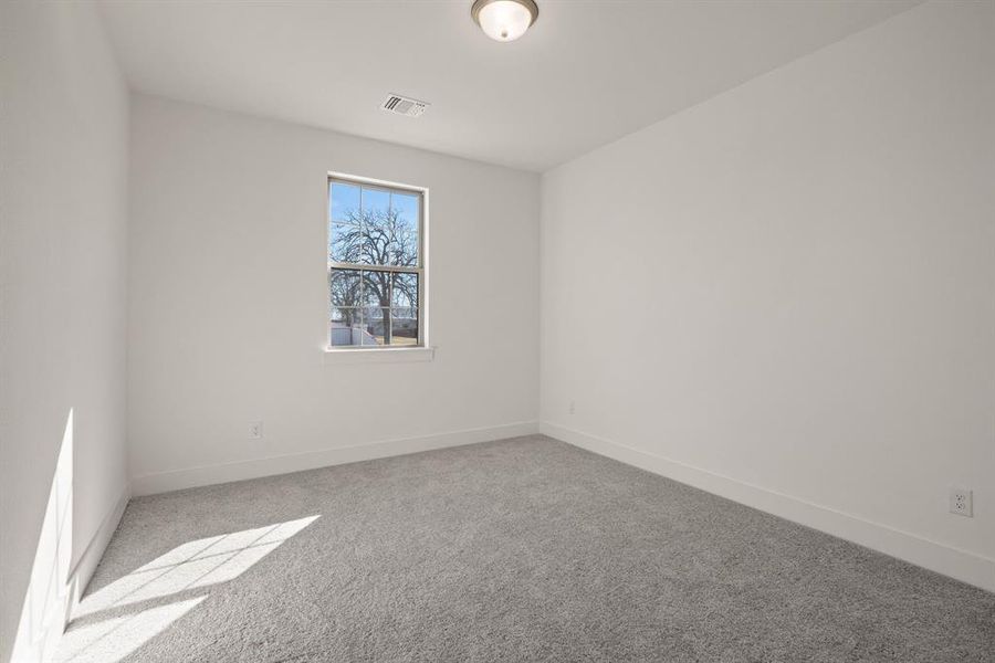 Spacious, unfurnished interior of a new home in Saddleback Estates, Boyd (Image 14).