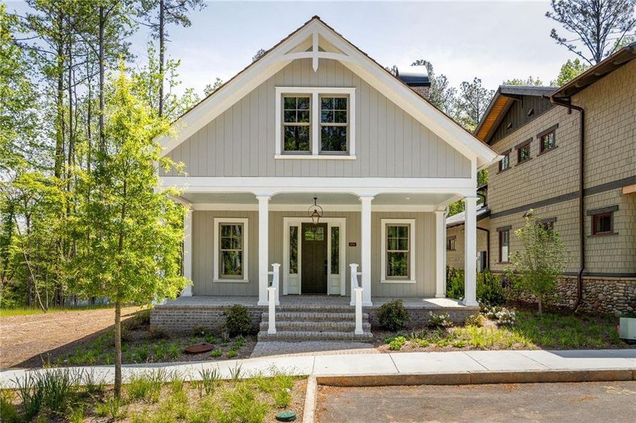 Front exterior of a new home in , Chattahoochee Hills, GA, highlighting curb appeal (Image 20).