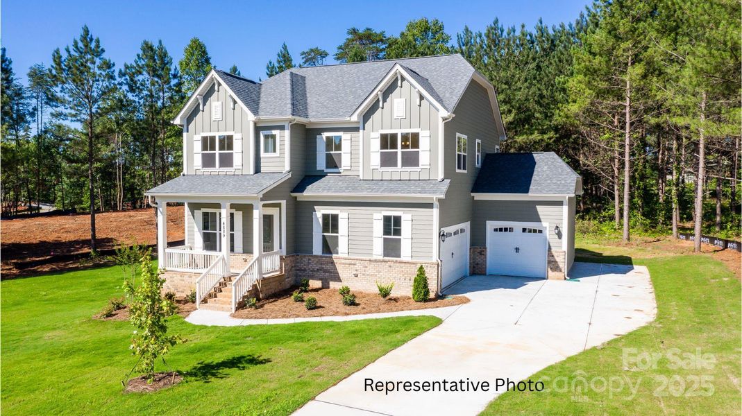 Front exterior of a new home in Edmunds Farm, Clover, SC, highlighting curb appeal (Image 24).