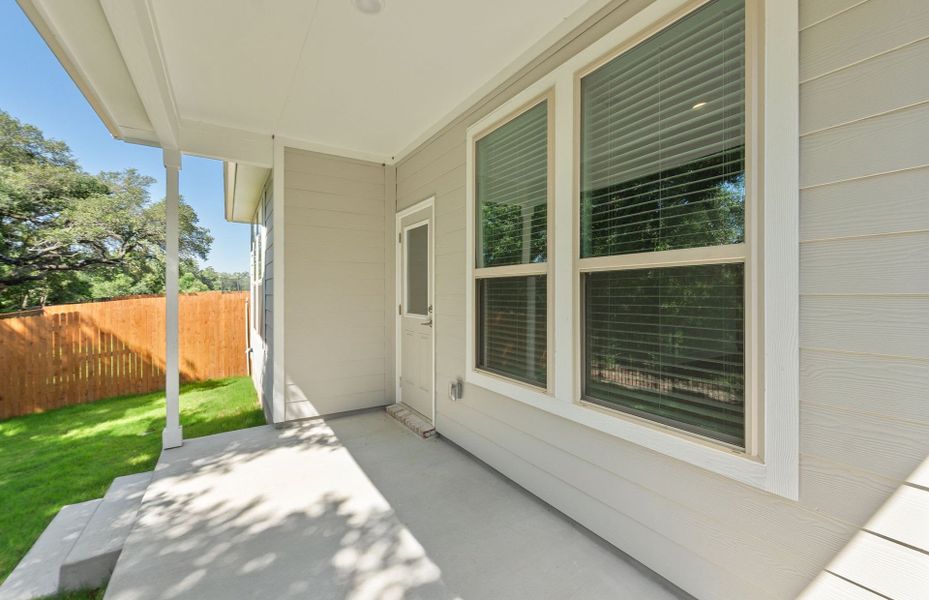 Exterior details and patio area of a home in Saddleback at Santa Rita Ranch, Liberty Hill (Image 26).
