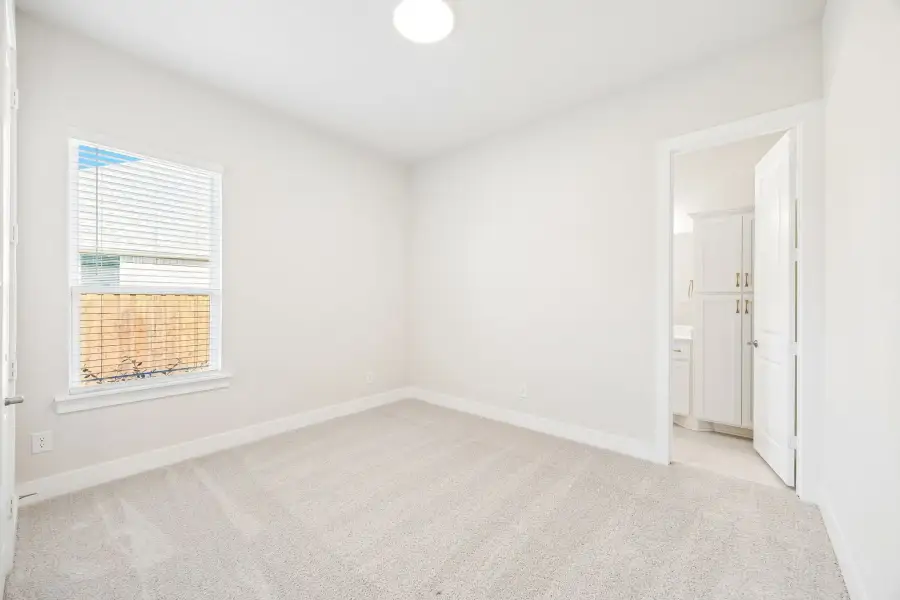 Spacious, unfurnished interior of a new home in Rainwater Crossing, Celina (Image 29).