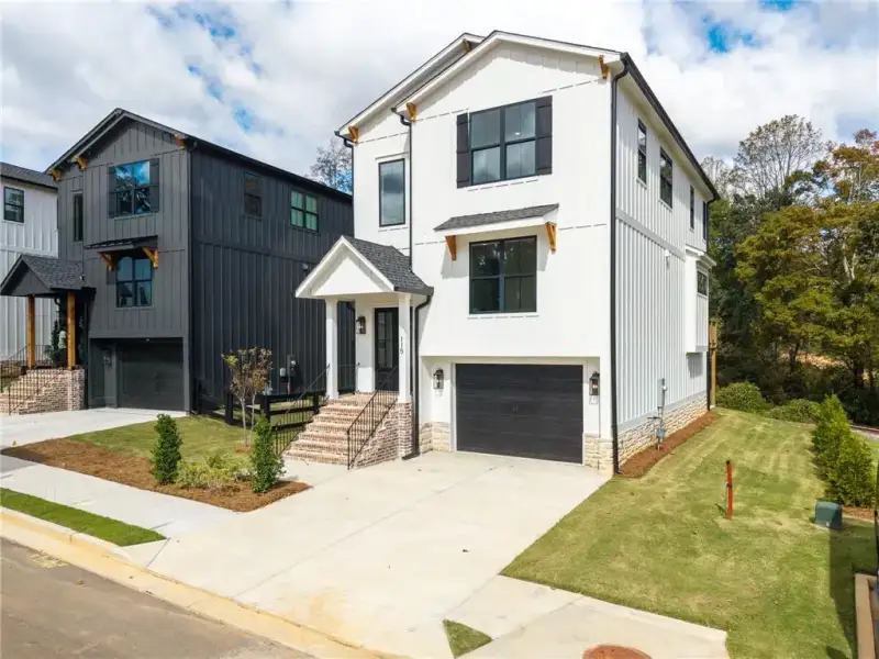 Front exterior of a new home in , Ball Ground, GA, highlighting curb appeal (Image 27).