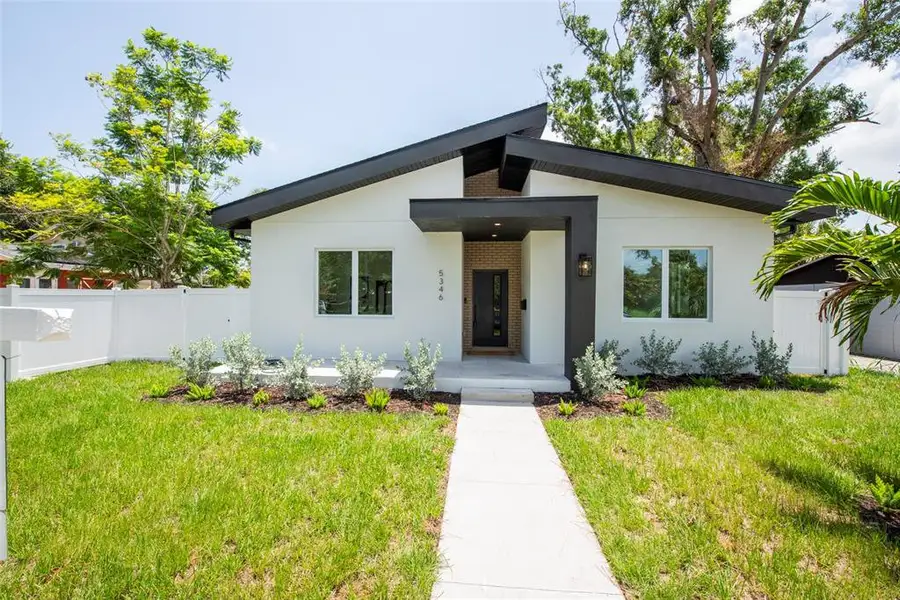 Front exterior of a new home in , St. Petersburg, FL, highlighting curb appeal (Image 28). Front exterior of a new home in , St. Petersburg, FL, highlighting curb appeal (Image 28).