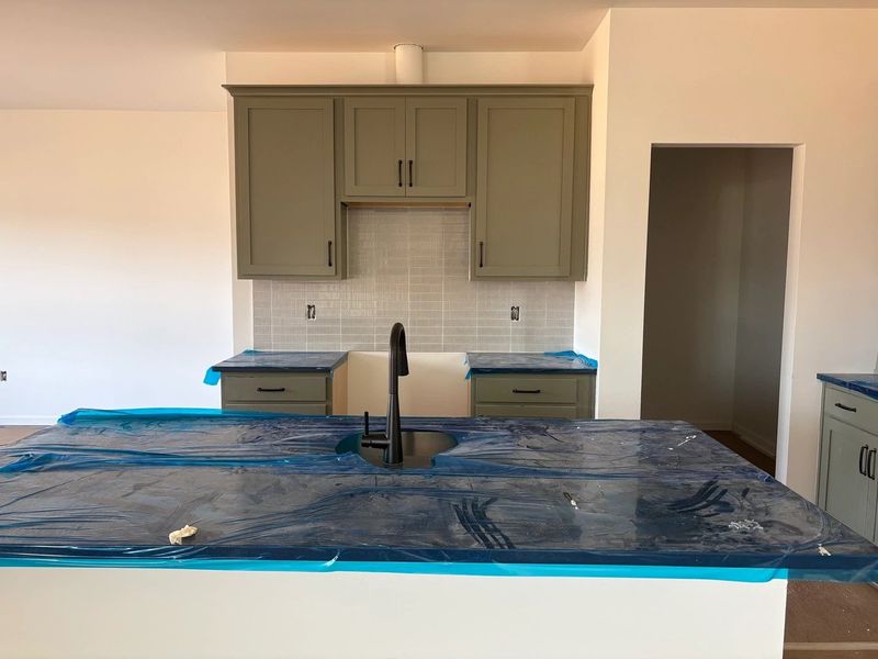 Kitchen featuring the AW Collection® Rosemary - Matte black, light wood, and garden-inspired style. Kitchen featuring the AW Collection® Rosemary - Matte black, light wood, and garden-inspired style.