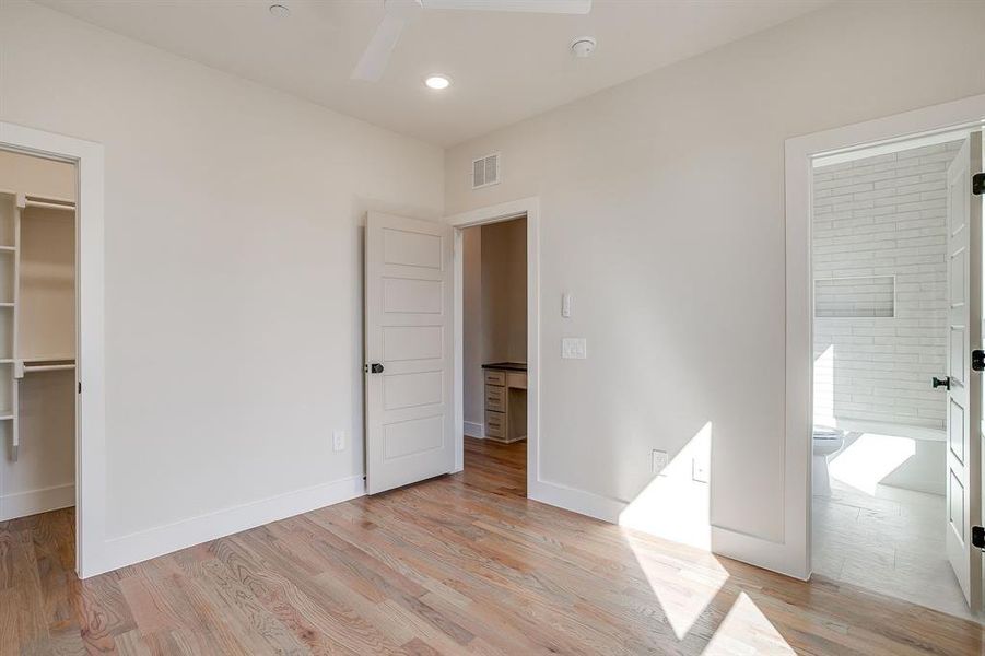 Moody, modern bedroom designed for both rest and refined living in Linwood Quarter. Moody, modern bedroom designed for both rest and refined living in Linwood Quarter.