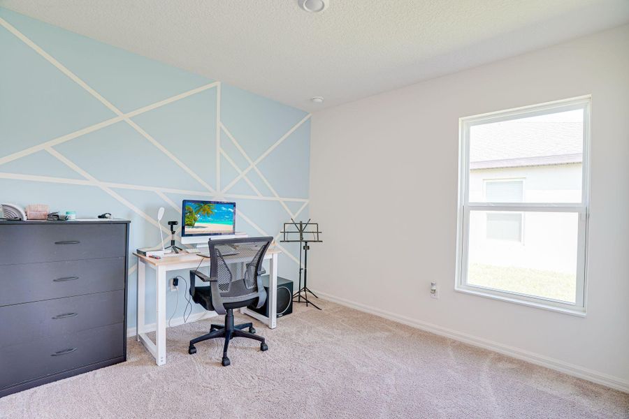 Furnished interior view inside a new home in Celebration Pointe, Fort Pierce (Image 13).