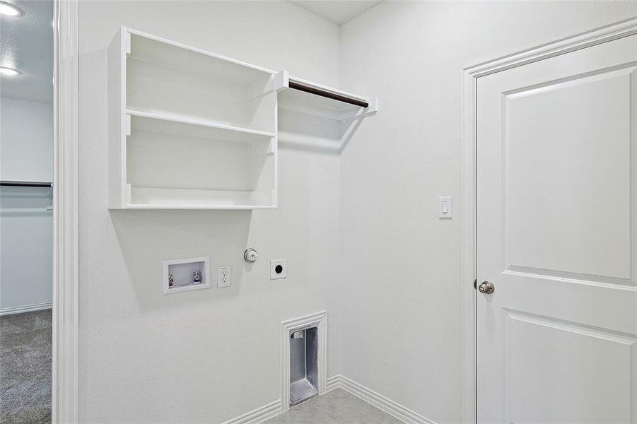 Laundry area featuring hookup for a washing machine, hookup for a gas dryer, and hookup for an electric dryer