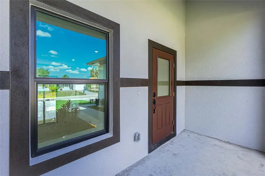 Exterior details and patio area of a home in , Port Charlotte (Image 31).