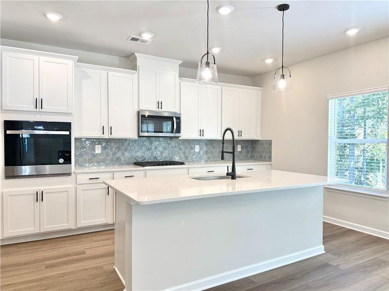 Furnished interior view inside a new home in Vines at Mill Creek - Estate Series, Braselton (Image 10). Furnished interior view inside a new home in Vines at Mill Creek - Estate Series, Braselton (Image 10).
