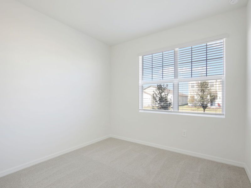 Spacious, unfurnished interior of a new home in Coasterra - Reserve Series, Palmetto (Image 19).