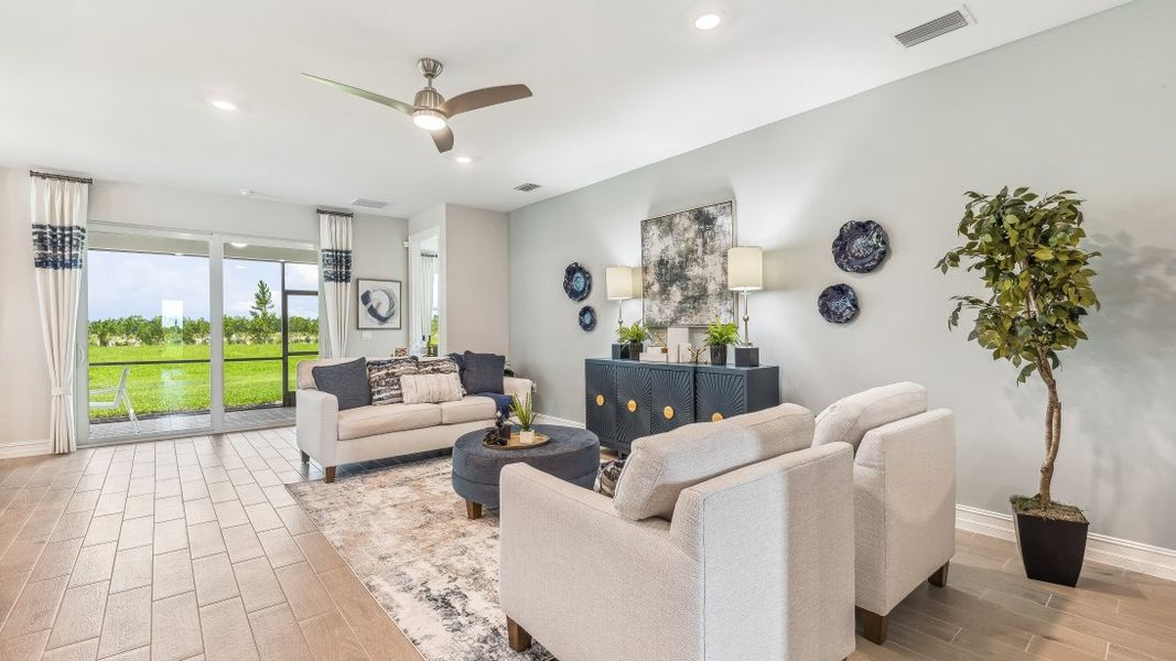 Representative furnished interior of a home built from the DELRAY by D.R. Horton in Palmetto Landing at Babcock Ranch, Punta Gorda (Image 6).
