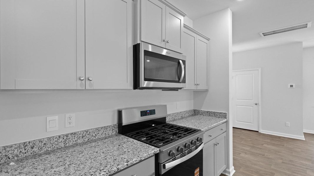Furnished interior view inside a new home in Pine Hills at Cane Bay, Summerville (Image 3).