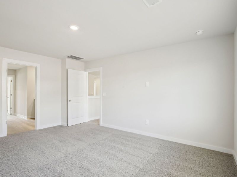 Primary suite in the Dakota floorplan in a Meritage Homes community.