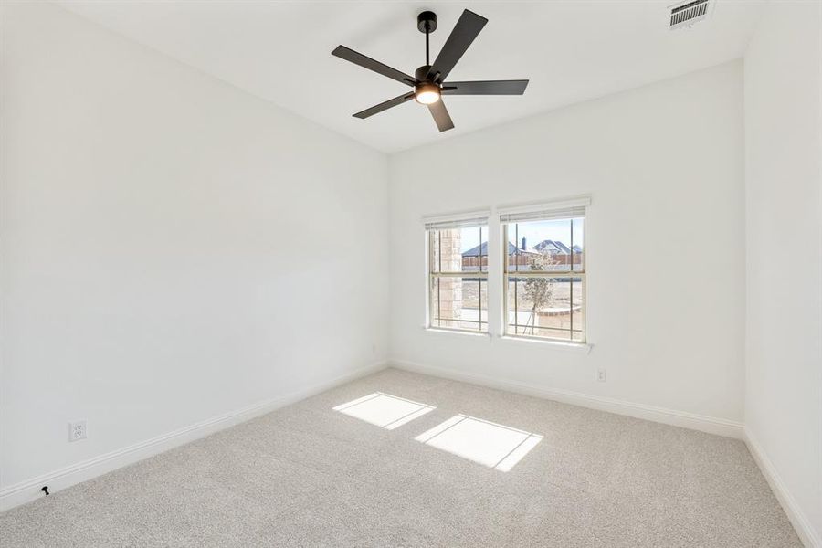 Spacious, unfurnished interior of a new home in Villages of Hurricane Creek, Anna (Image 35).