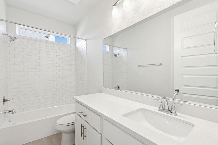 Furnished interior view inside a new home in The Colony, Bastrop (Image 11).