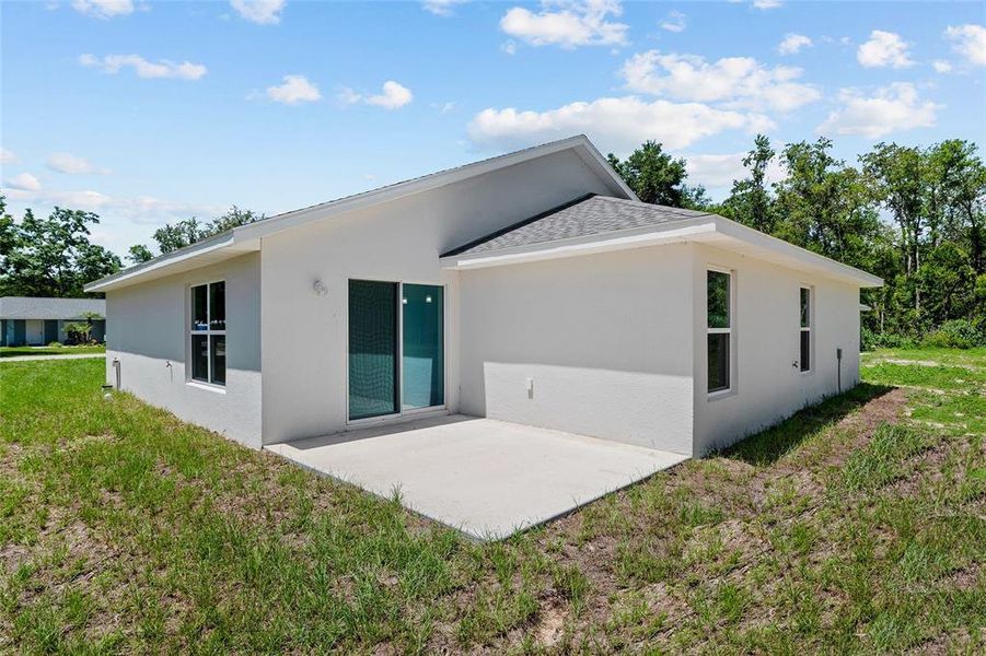 Exterior details and patio area of a home in , Ocala (Image 3).